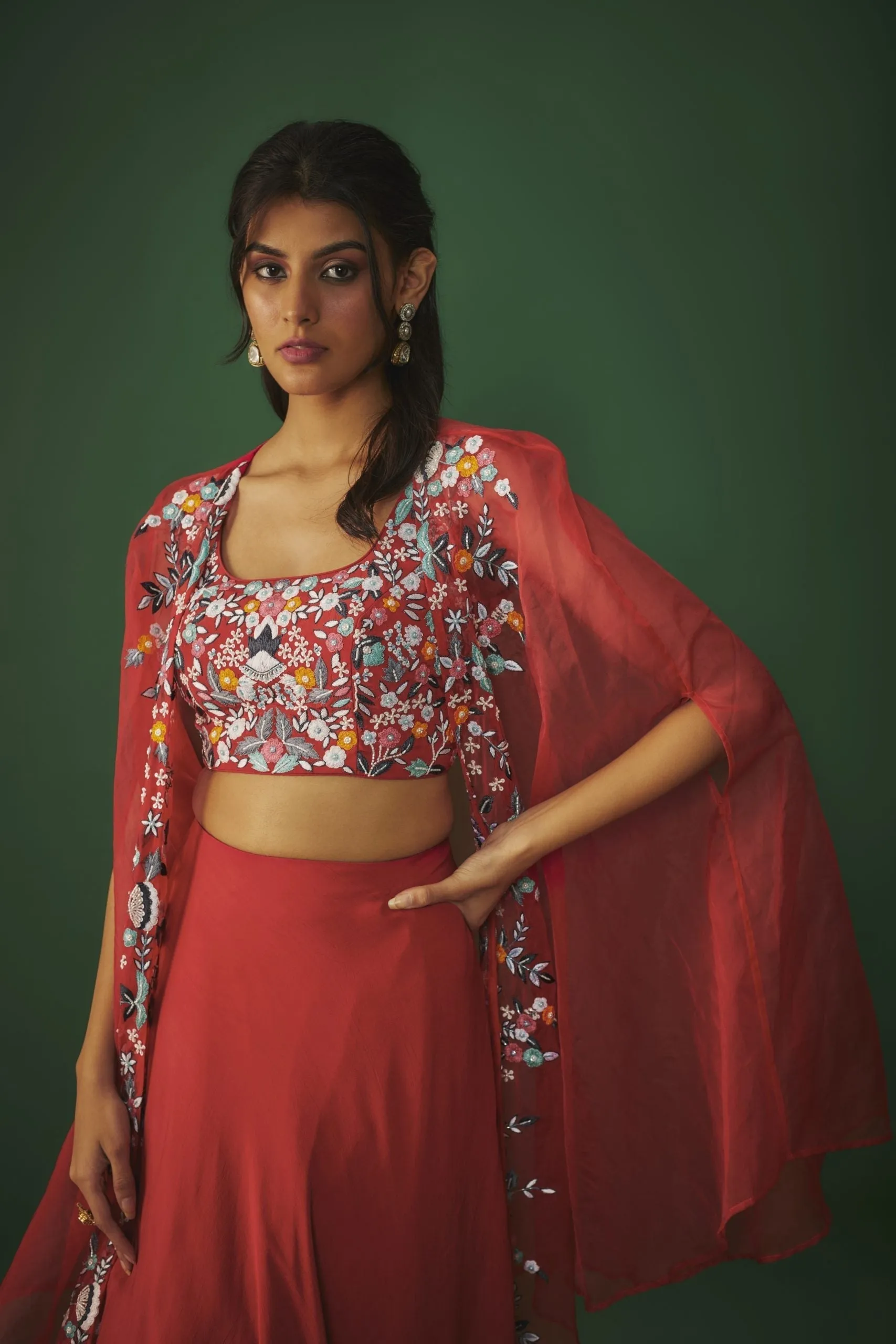 RED THREADWORK EMBROIDERED CHOLI, CAPE AND LEHENGA SET